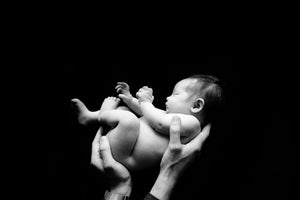 "Holding baby aloft" - Tina Cleary